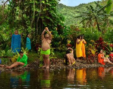 people by a river