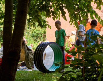 children outdoors near trees 
