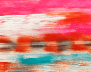 A detail shot of a felt installation shot. Streaks of purple, orange, and white form a horizontal pattern.