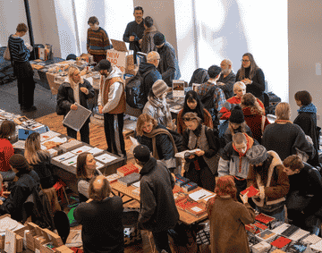 A busy market fair in Gallery 3