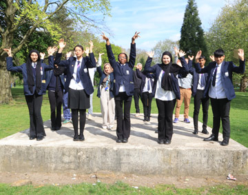A school group standing in the park