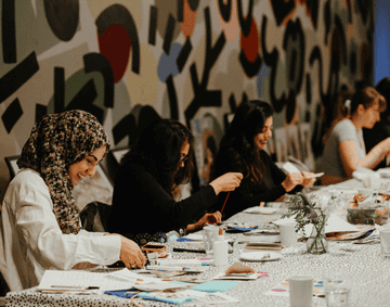 A group of midwife and maternity healthcare professionals crafting. 