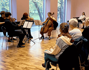 A group of musicians playing the Whitworth's Gallery 3