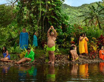 figures by a river