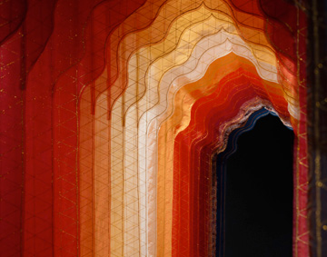 coloured textiles forming an archway