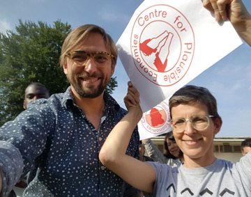 Two people holding a sheet of paper with the words Centre for Plausible Economies

(Centre for Plausible Economies: Image credit: Kathrin Böhm and Kuba Szreder. Image credit: courtesy the artist.)