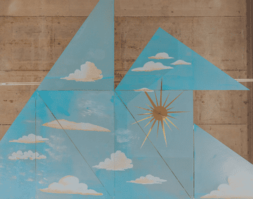 Blue sky background with clouds and a yellow sun and the right hand corner
