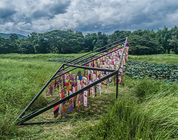 textiles on a grassy hill