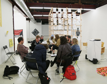 a group of people sat in a studio space

(Broadcasting the archive 02, The Luminary, St. Louis (USA), 2015. Photo Brea Youngblood.)